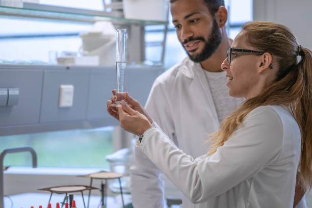 istock Chemistry professor and students in the laboratory 1457228177