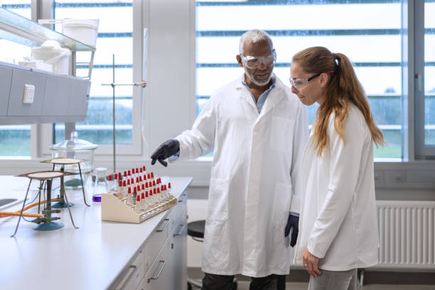 istock Chemistry professor and students in the laboratory 1457228196