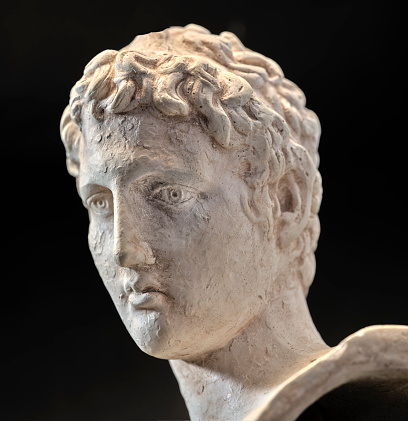 Roman marble statue of black background