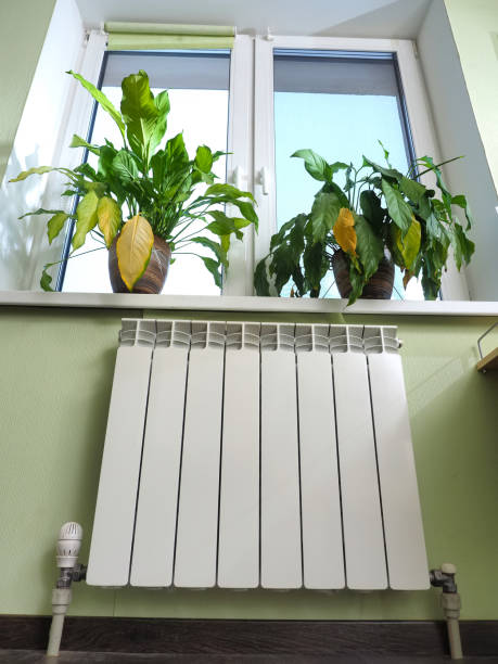 istock metal radiator with heat regulator 1457233205