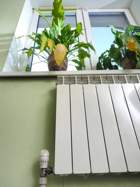 istock metal radiator with heat regulator 1457233209