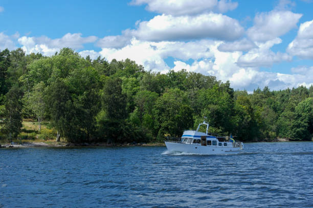 istock Small boat traveling in archipelago during summer 1457233773