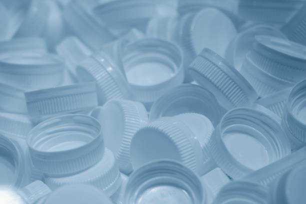 The pile of plastic bottle caps.