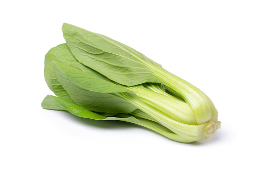 Mustard pakcoy (bok choy or mustard green) vegetable isolated on white background.