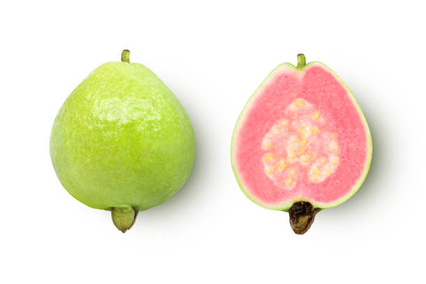 istock Pink guava fruit with slice isolated on white 1457243375