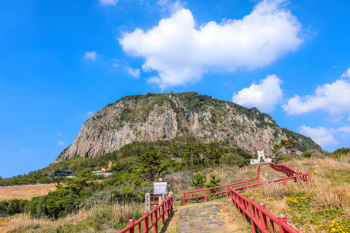 This is a beautiful view of Sanbangsan Mountain, a famous tourist attraction in Jeju Island, South Korea.
