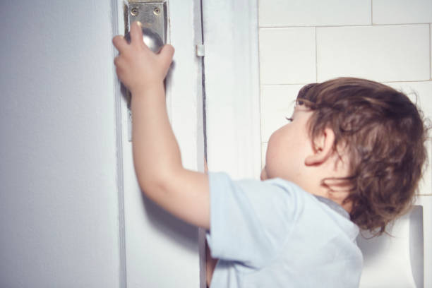 View of a toddler opening door