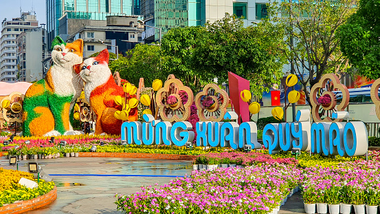 Ho Chi Minh City, Vietnam - January 18, 2023 : Decoration At Main Entrance With Family Cat Sculpture In Nguyen Hue Flower Street Festival.