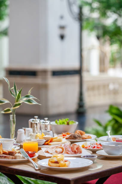 istock Delicious dishes, including fruits, pastries, cooked meals on table 1457259307