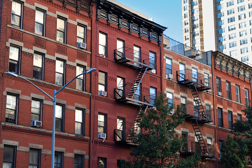 Block of old apartment buildings in the East Village neighborhood of Manhattan in New York City NYC