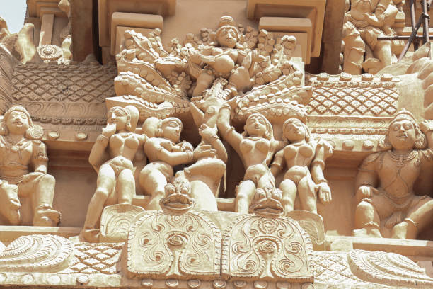 The eaves (or overhangs) and upper facades of renaissance buildings in the old quarter of Palma de Mallorca.  This architectural styling was popular across Europe in the medieval period among the elite and originated in Italy.  Sepia finish.