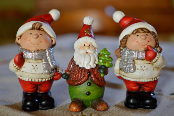 istock clay Christmas figurines at the table 1457268722