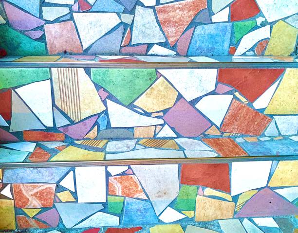 istock Background of multi colored stones mosaic on stairs 1457275173