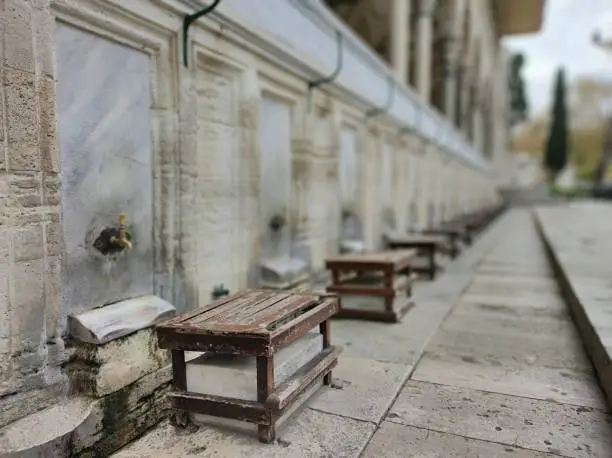 benches and fountains of a mosque for ablutions