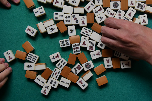 Image of mixing mahjong tiles
