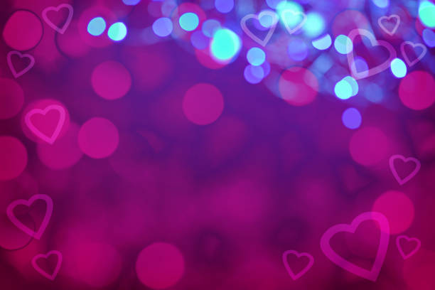 istock Frame made of glowing hearts and defocused lights with space for copy 1457285299