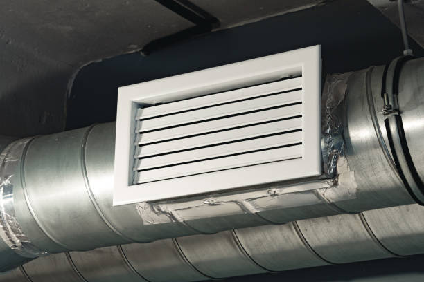 istock Silver ventilation pipes hanging from the ceiling inside the building 1457294191