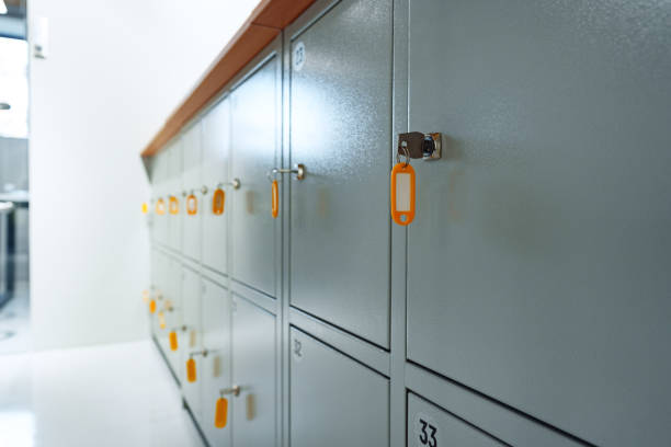 istock Gray locker with key for safety in public facility 1457294361
