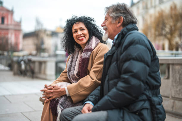istock Good Looking Latin Woman with Senior Man Spending Time Together 1457297773