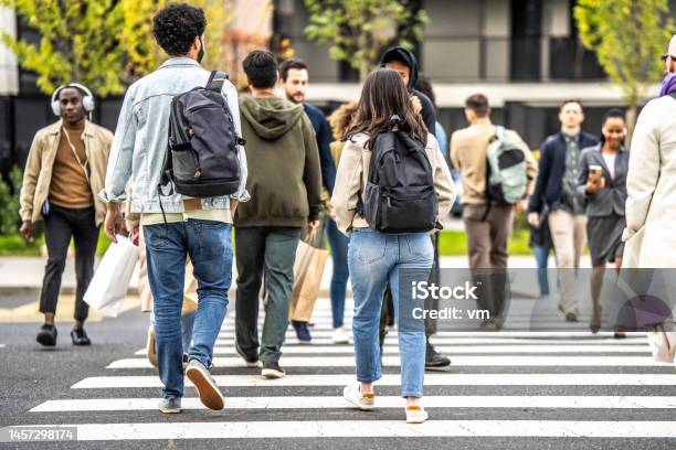 Citizens Crossing Crowded Zebra Wide Shot Stock Photo - Download Image Now - Walking, People, City