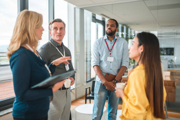 istock Female Caucasian Project Leader Giving Instructions 1457298296