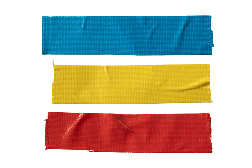 Blue, yellow and red cloth tape on white background with clipping path