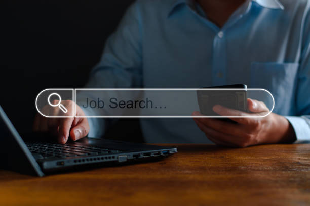 istock Job Search Technology Search Engine Optimization. Business people are searching for work information in digital databases, search jobs, apply online jobs, business information. 1457298655