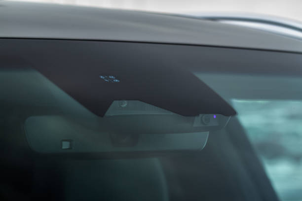 istock Rain and light sensor on the windshield of the car 1457303827