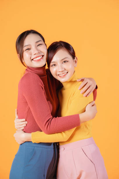 istock Image of two young Asian woman on background 1457305628