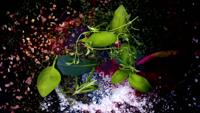 Herbs, Basil, Rosemary, Paprika, Salt Spice Mix Swirling in Super Slow Motion