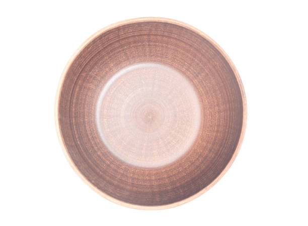 istock Stylish brown clay bowl isolated on white background 1457311235