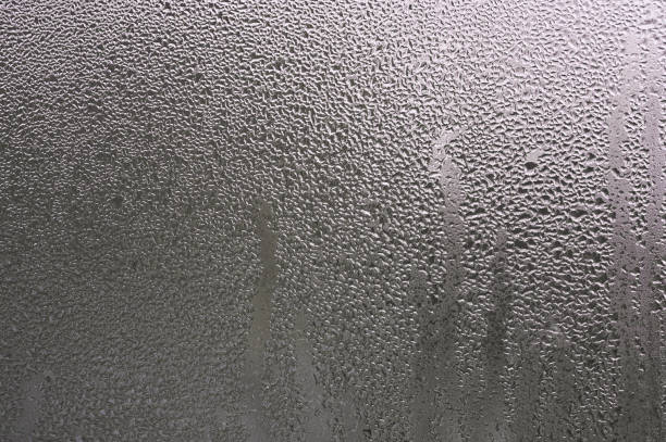 istock condensation on the window. water drops on the glass. 1457314669
