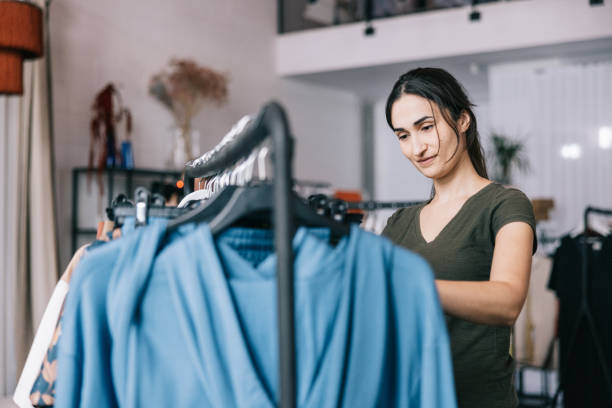 istock Latin woman shopping on the weekend 1457314885