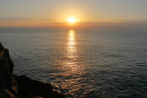 istock overlooking the sunrise,Katsurahama,Winter (from Ryuo Misaki Observatory, Kochi City, Kochi Prefecture) 1457320855