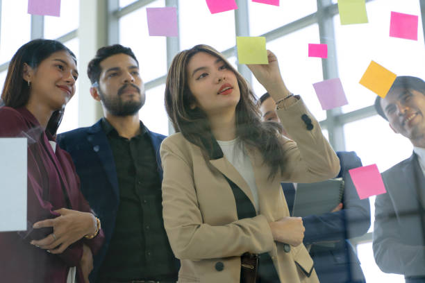 istock Coworkers are working in meeting room. 1457320941