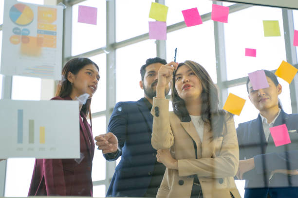 istock Coworkers are working in meeting room. 1457320957