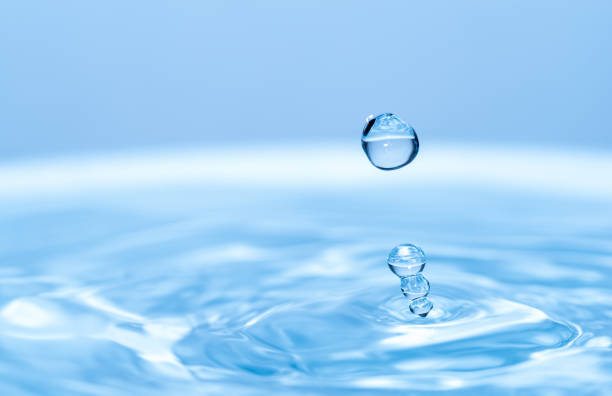 action shot of water droplets action shot of water droplets splash crown stock pictures, royalty-free photos & images