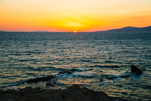 Sunset view from Mykonos town (Chora), Mykonos island, Cyclades, Greece.