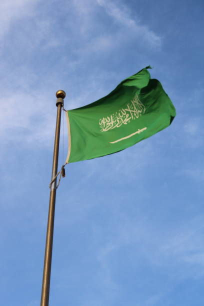 istock Saudi Arabian flag flying in the sky 1457328294