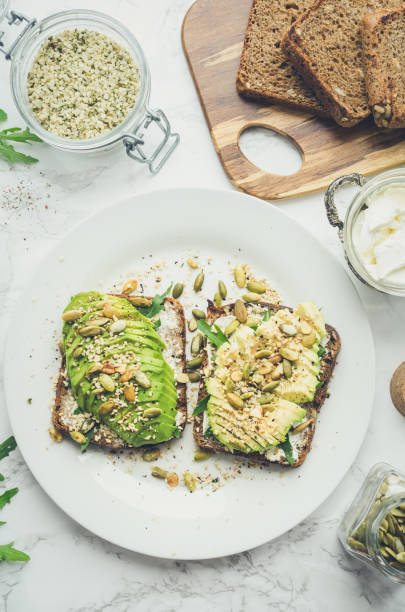 istock Healthy avocado toasts for breakfast or lunch with rye bread 1457330061