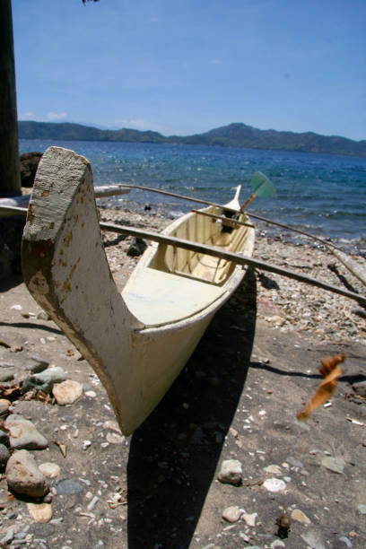istock Moored boat on sea side 1457330576