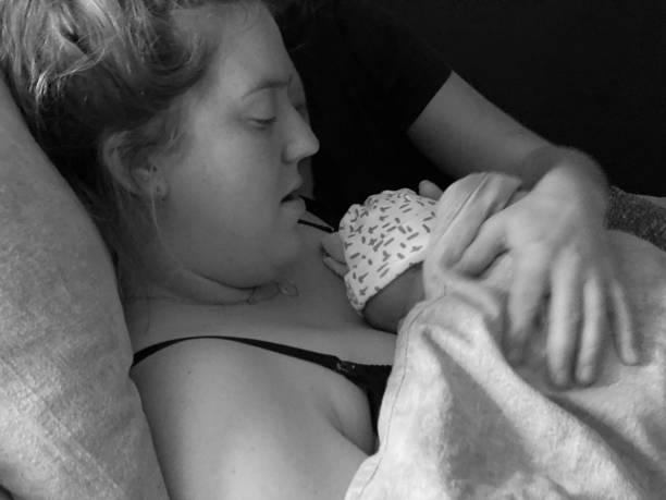 istock Just born baby with parents 1457330739