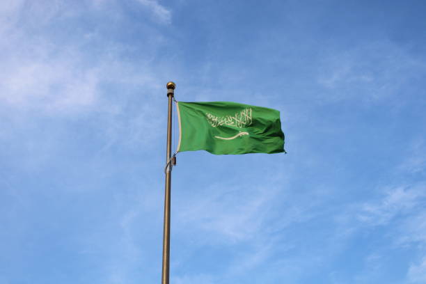 istock Saudi Arabian flag flying in the sky 1457331014