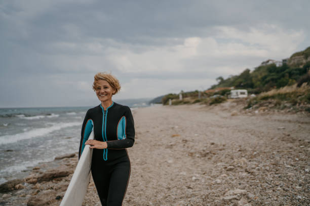 istock Woman surfer 1457332262