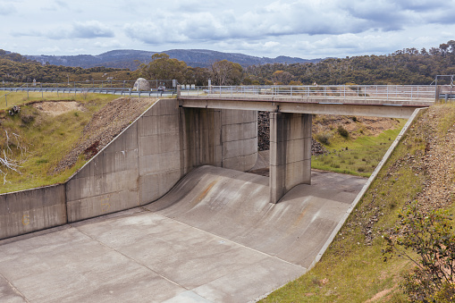 Tooma Dam from the Tooma River forming as part of the Snowy Mountains Hydro Electric power scheme in New South Wales, Australia