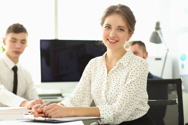 istock Business people sit and work focus on beautiful woman 1457333587