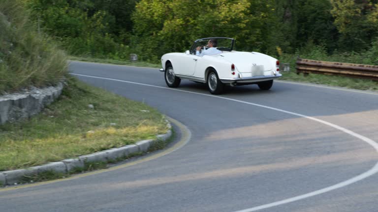 Man driving cabriolet