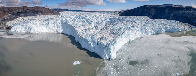 Aerial panoramic front view of the 5 kilometers long Eqi glacier, Greenland