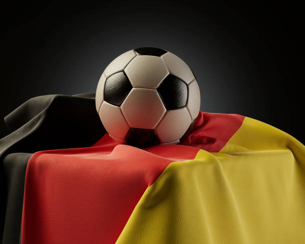 istock Soccer Ball And Germany Flag 1457346134