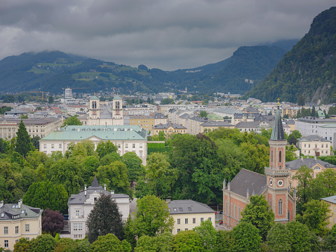 Salzburg Austria inner city with churches. Beautiful view of Salzburg skyline with Evangelical Parish Salzburg Christ Church on first plan